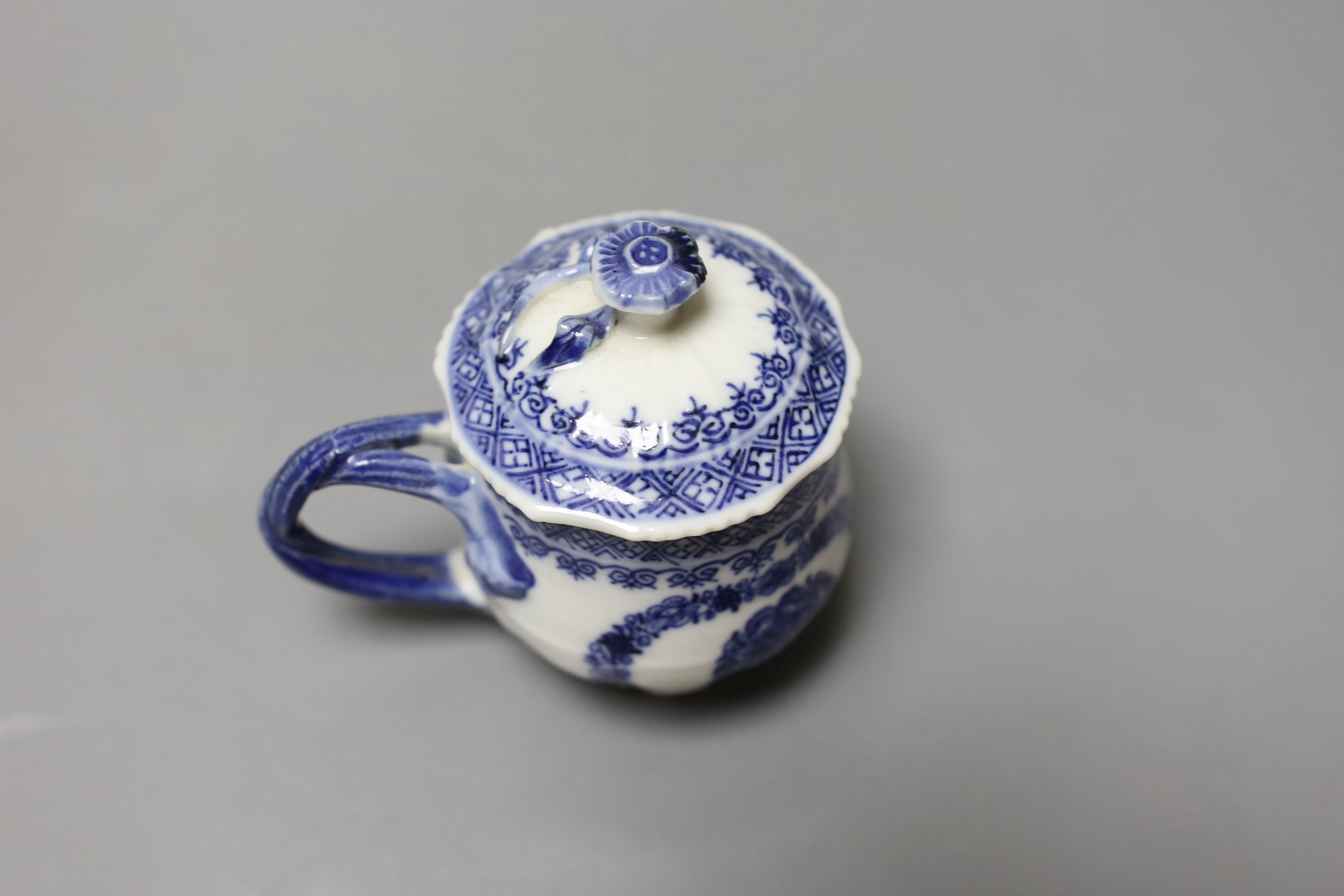 Chinese custard cup and cover painted in under-glaze blue with stylised flowers - 9cm tall